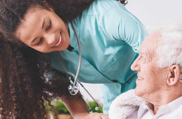 nurse talking to a pensioner